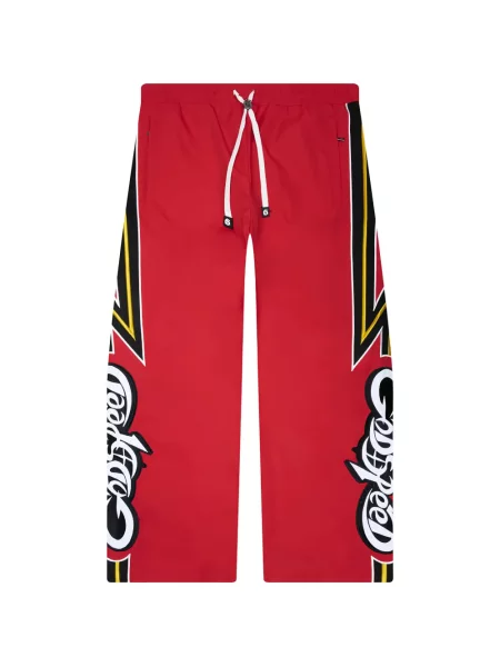 Pruhované běžecké kalhoty Godspeed s autogramem červené