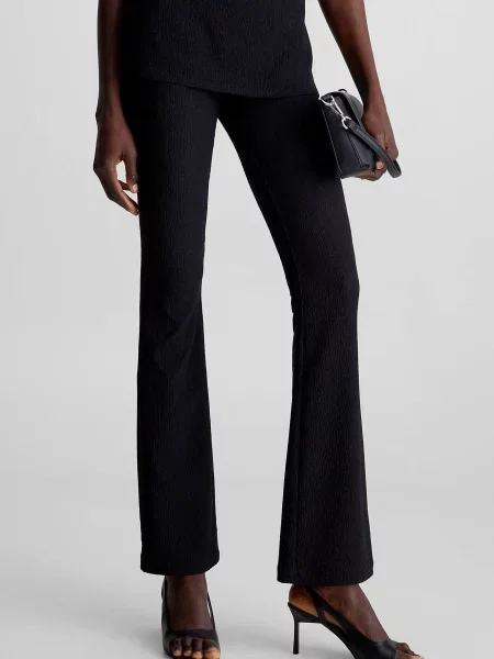 Штани Calvin Klein з джерсі кльош чорні