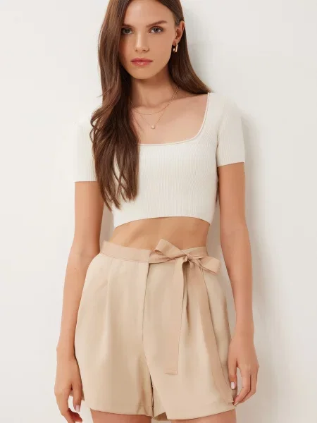 Happiness İstanbul Pantaloni cutați cămilă maro