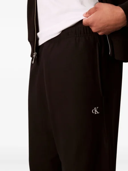 Pantaloni Calvin Klein Jeans alergare cu autograf negru