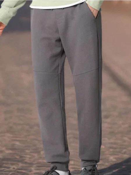 Sinsay Teplákové kalhoty se širokými nohavicemi šedá