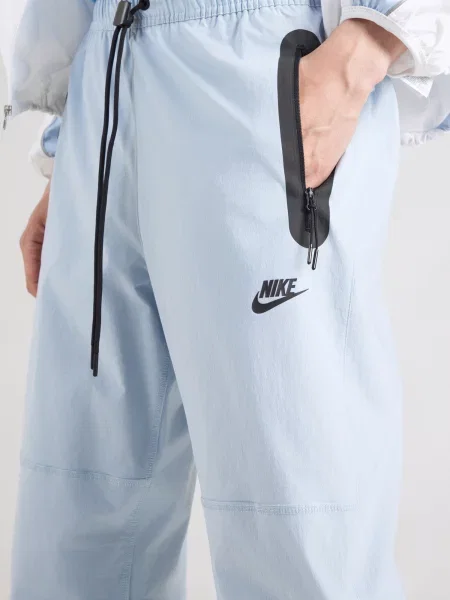 Nike Sportswear Nohavice pastelovo modrá čierna