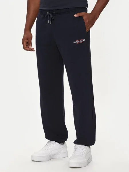 Športové nohavice Guess Jeans modrá