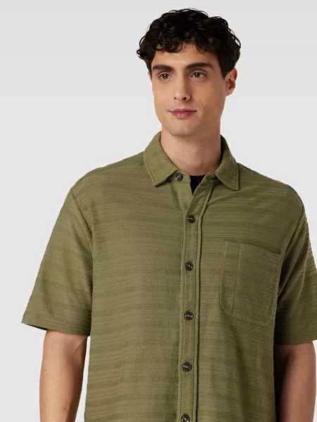 Koszula casualowa o luźnym kroju z kieszenią na piersi Knowledgecotton Apparel oliwkowa