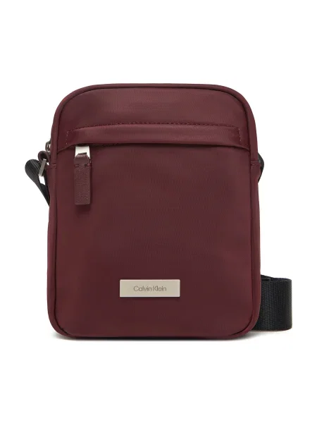 Geantă crossover Calvin Klein Sleek Reporter Vișiniu bordo
