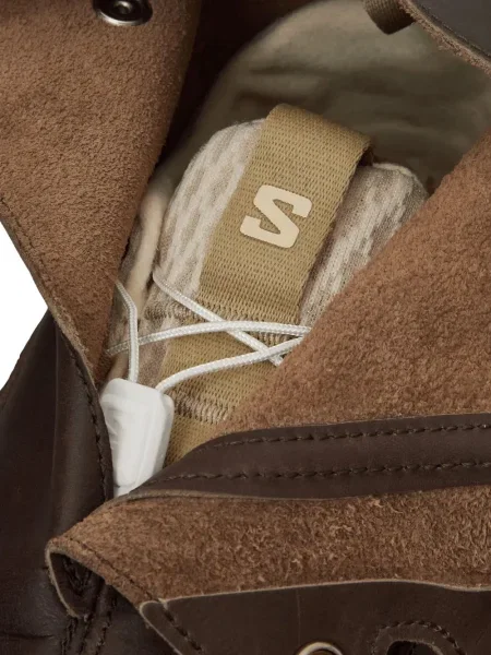 Sneakerși Salomon din piele maro