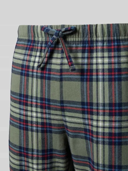 Spodnie od piżamy o kroju regular fit we wzór na całej powierzchni Christian Berg Men zielone