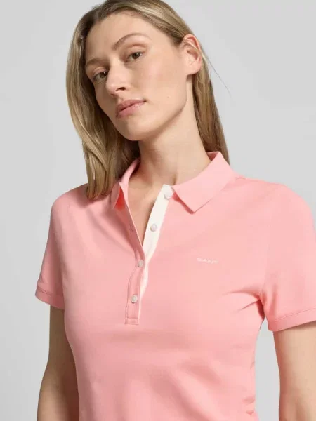 Sukienka polo do kolan z wyhaftowanym logo Gant różowa