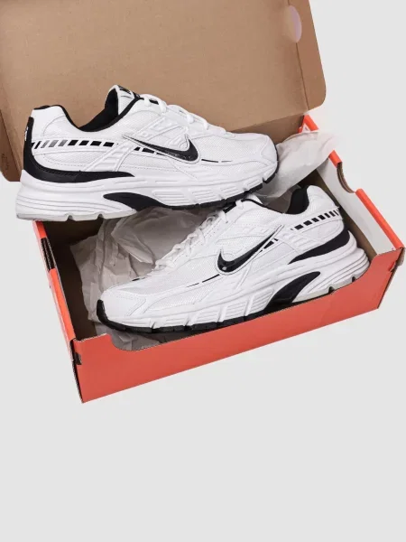 Кожаные кроссовки Nike белые