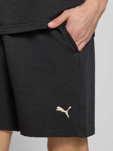 Szorty z przeszyciem z logo Puma Performance czarne