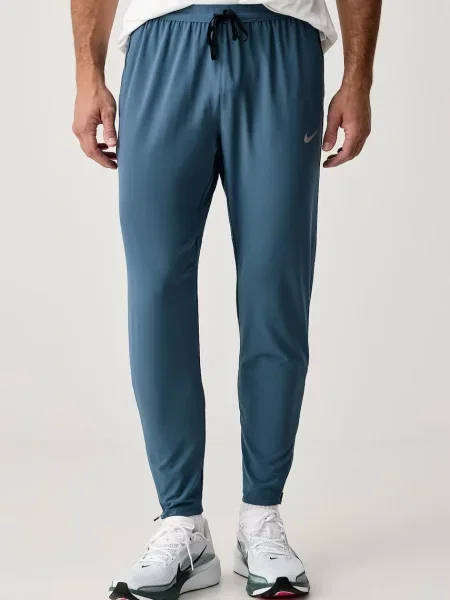 Nike spodnie dresowe Stride Dri-FIT niebieskie