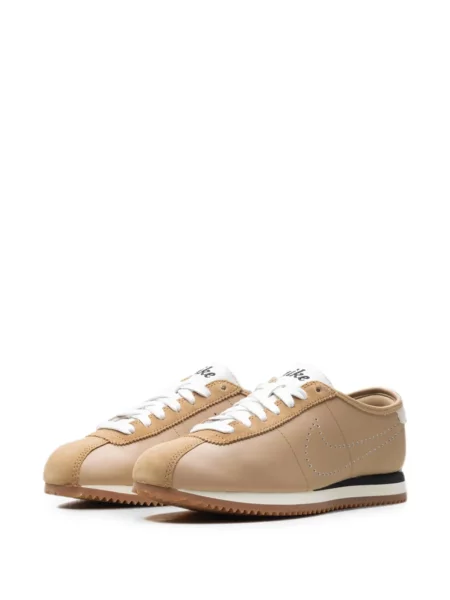 Sneakerși Nike Cortez cu autograf din piele maro