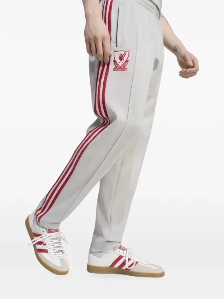 Ριγέ τρέξιμο παντελόνι Adidas με κέντημα γκρι
