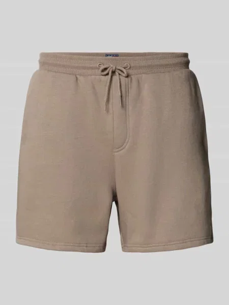Szorty z bawełnianej mieszanki w kroju regular fit Tommy Jeans brązowe