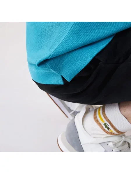 Поло Lacoste голубое