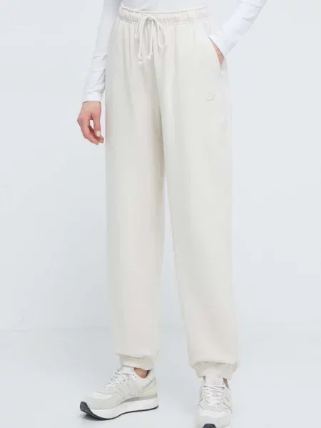 Спортен панталон New Balance с изчистен дизайн бежово