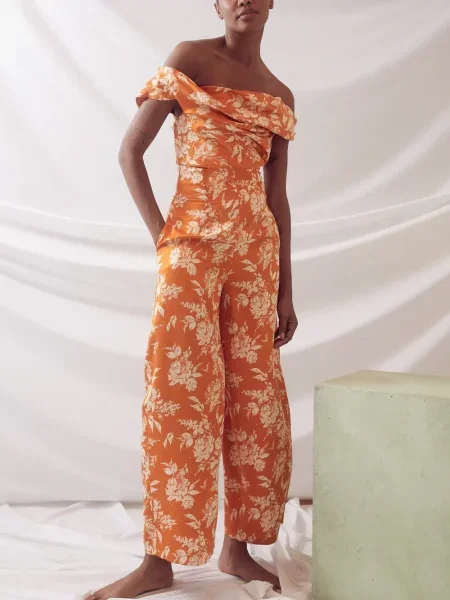 Gėlėtos kelnės Rosie Assoulin oranžinė