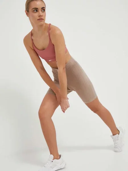 Podprsenka na jogu Reebok oranžová