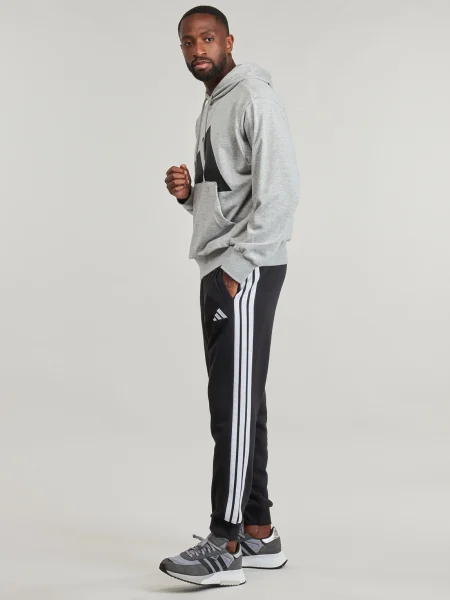 Fleecové pruhované jogger nohavice Adidas čierna