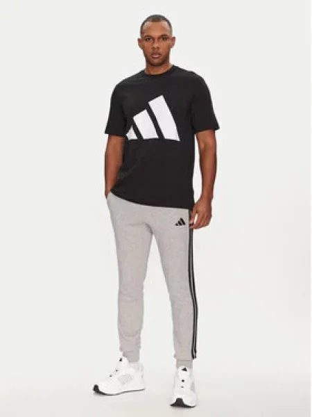 Adidas Teplákové kalhoty Essential šedá