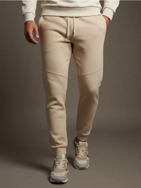 Sinsay Spodnie jogger dresowe pique beżowy