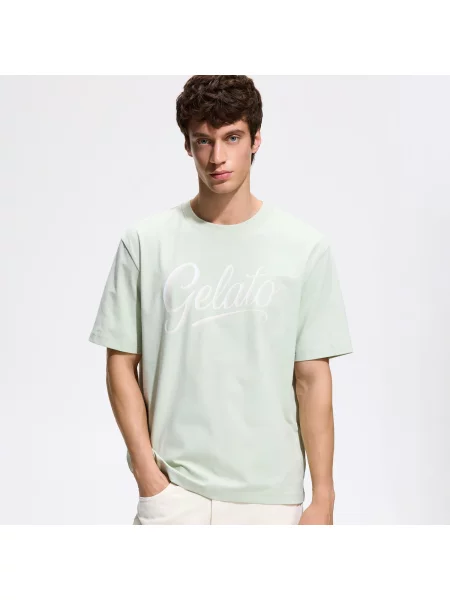 Reserved Tričko relaxed fit s potiskem světle zelená