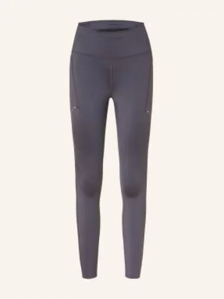 Nike Běžecké Legíny Swift tmavě fialová