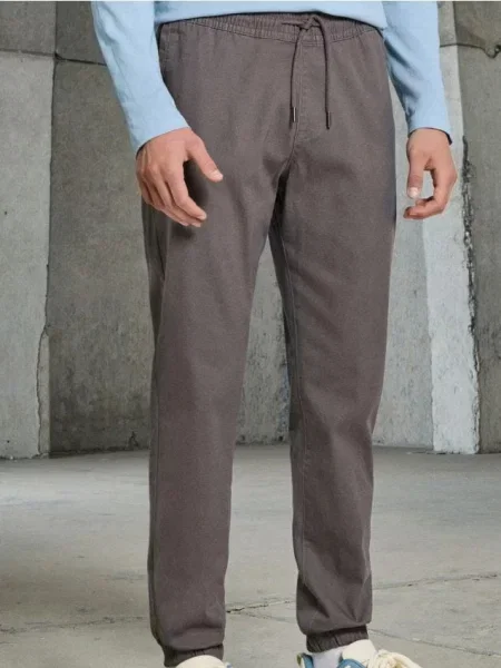 Sinsay Kalhoty joggers šedá