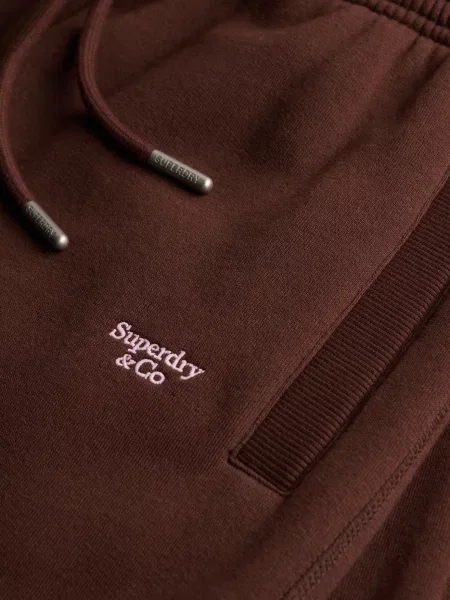 Superdry & Co Nohavice Signature hnedá ružová