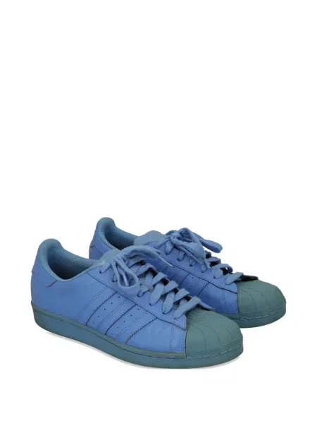Sneakerși Adidas Pharrell Williams din piele cu dungi albastru
