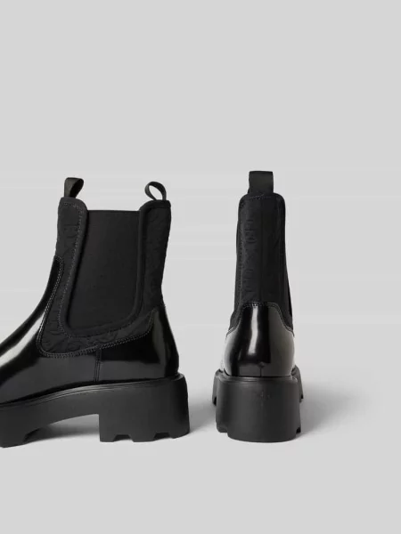 Buty chelsea z wytłoczonym logo Tory Burch czarne