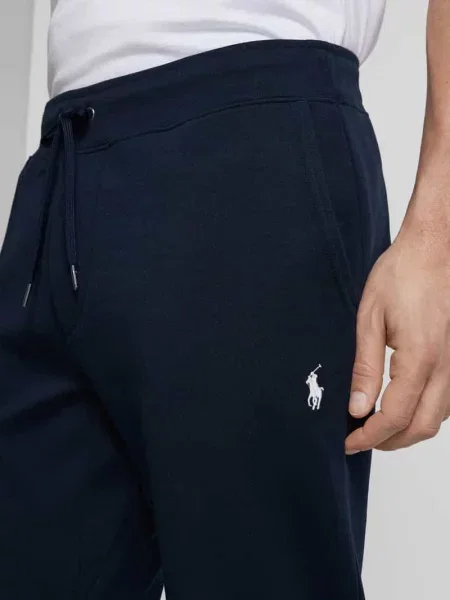 Dzianinowe spodnie Polo Ralph Lauren wiązane niebieskie