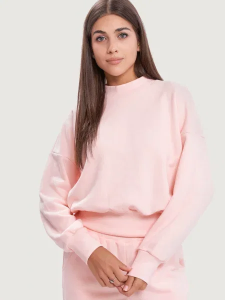 Свитер рожевий