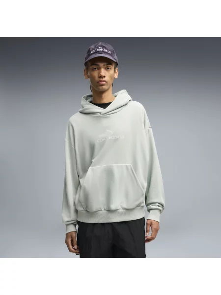 PUMA bluza z kapturem Run Culture Collective o kroju boxy Odzież S zielony