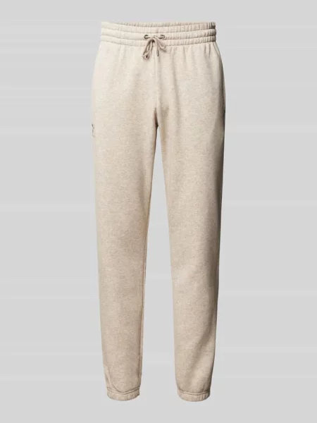 Spodnie Under Armour Jogger Icon Fleece jasne S beżowe