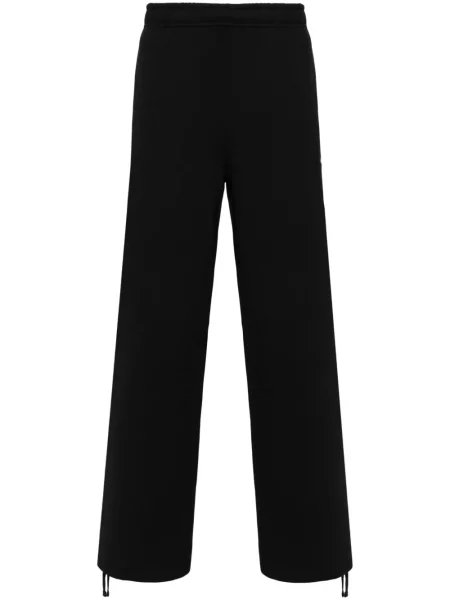 Zúžené kalhoty Nike černé