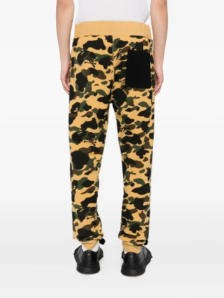 Pantaloni Mastermind Japan cu imagine maro