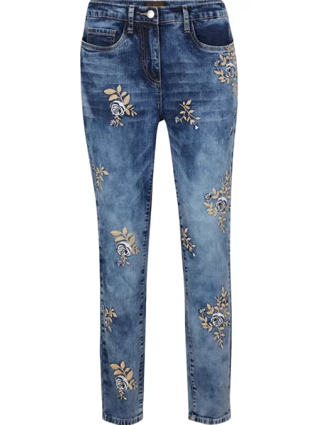 Dżinsy slim fit z kwiatowym haftem niebieskie