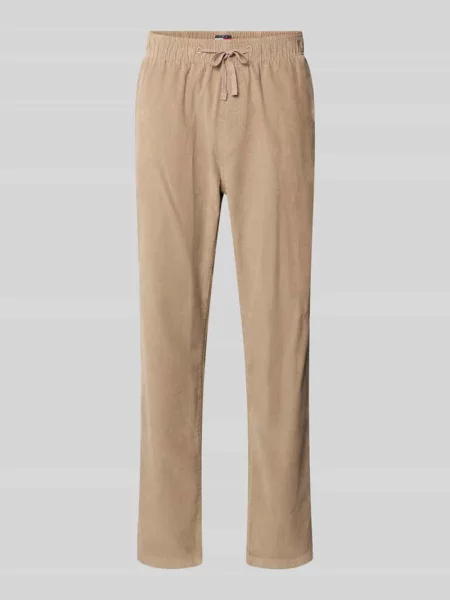 Spodnie sztruksowe o kroju tapered fit z czystej bawełny model ‘ISAAC’ Tommy Jeans beżowe