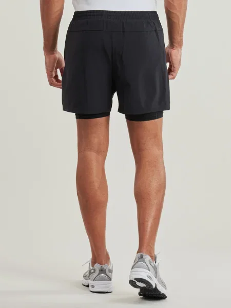 Pánske bežecké šortky New Balance Sport Essential Lined 5" black čierna