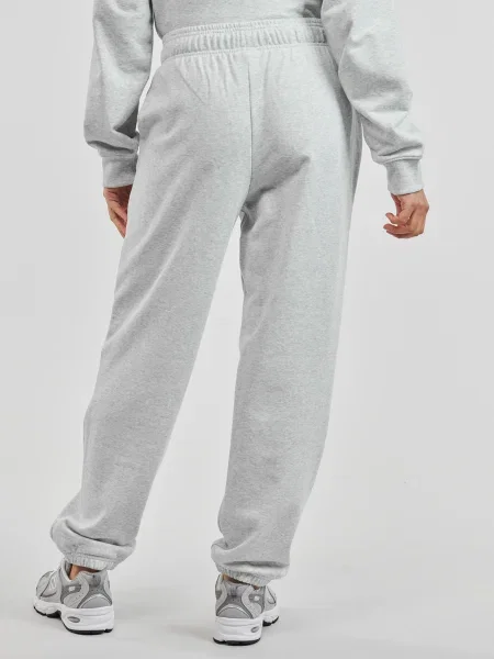 Dámske nohavice New Balance French Terry Jogger ashheath sivá