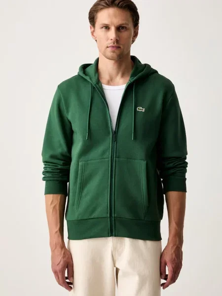 Lacoste pulover s kapuco z bombažem zelena