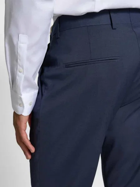 Spodnie garniturowe o kroju regular fit z dodatkiem wełny model „Tenutas” Tiger Of Sweden niebieskie