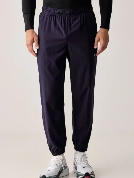Nike spodnie treningowe Form Dri-FIT fioletowe