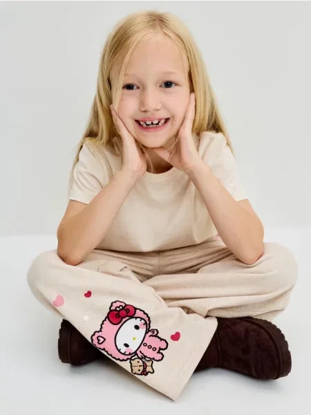 Sinsay Tepláky wide leg s potiskem Hello Kitty béžová