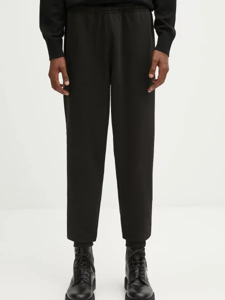 Tepláky Lacoste černá