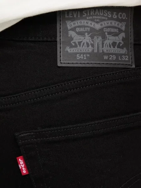 Proste jeansy Levi's 501 w paski ze stretchu dzwony niebieskie