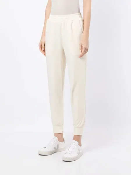 Spodnie Goodious do biegania zwężane białe