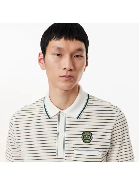 Поло Lacoste белое