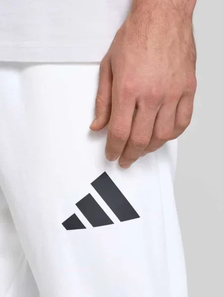 Spodnie dresowe z elastycznym pasem Adidas Sportswear biały